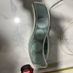 1990’s era. Set of hot rollers. Turn white when hot. All you need. Love these!!